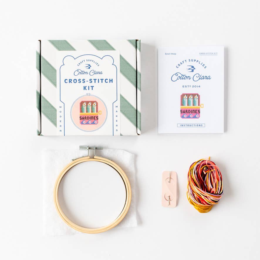 Sardines Cross-stitch kit with hoop, thread, and packaging on a white background