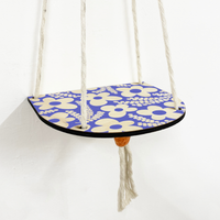 plant shelf with a blue floral design on a white background